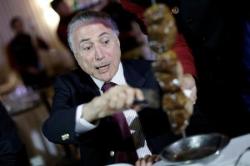 El presidente de Brasil, Michel Temer, en un asado con embajadores de países importadores de carne en Brasilia